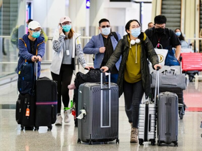 Passengers at the Hong Kong International Airport
