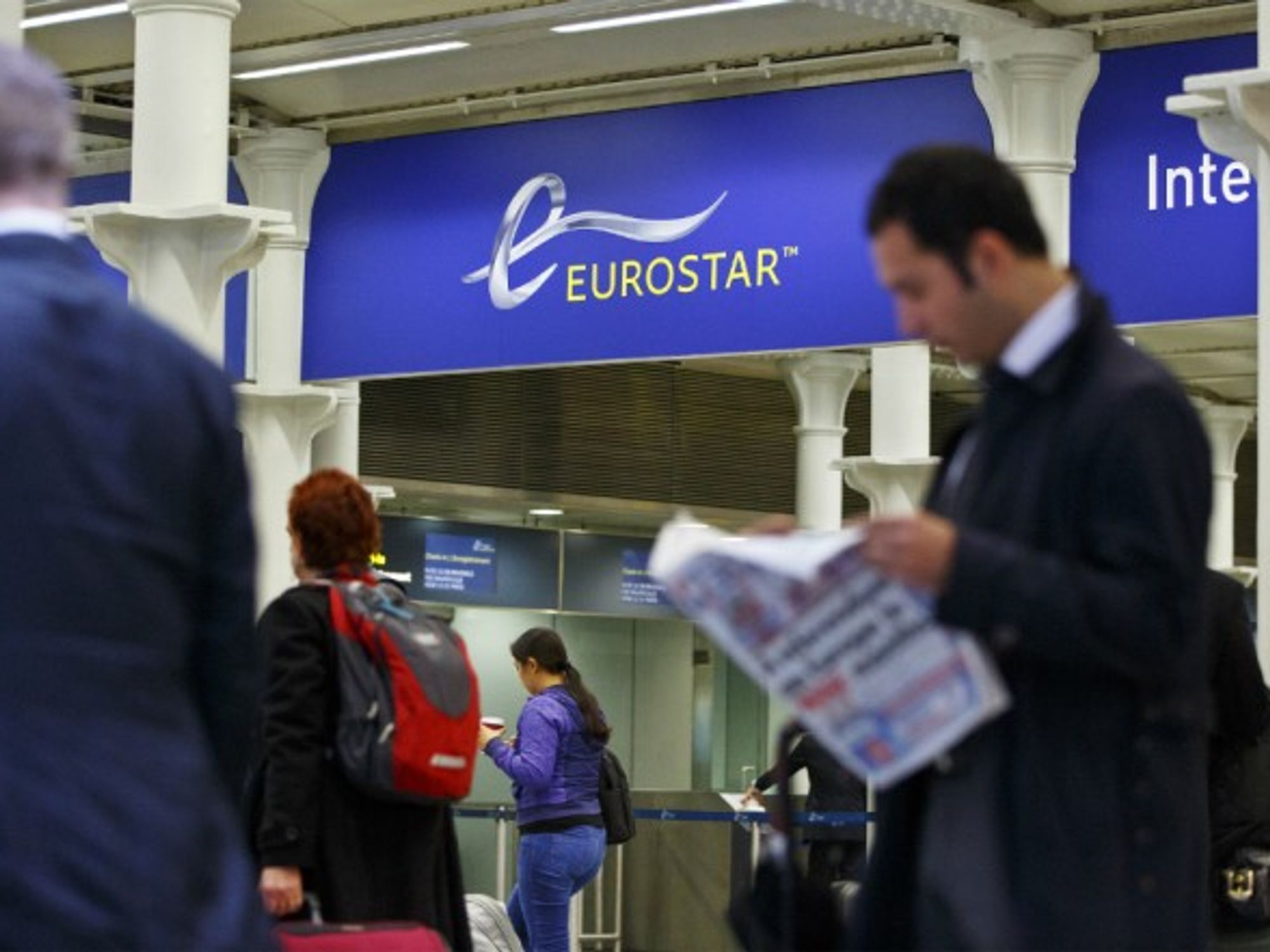 Passengers checking in to travel on Eurostar in London