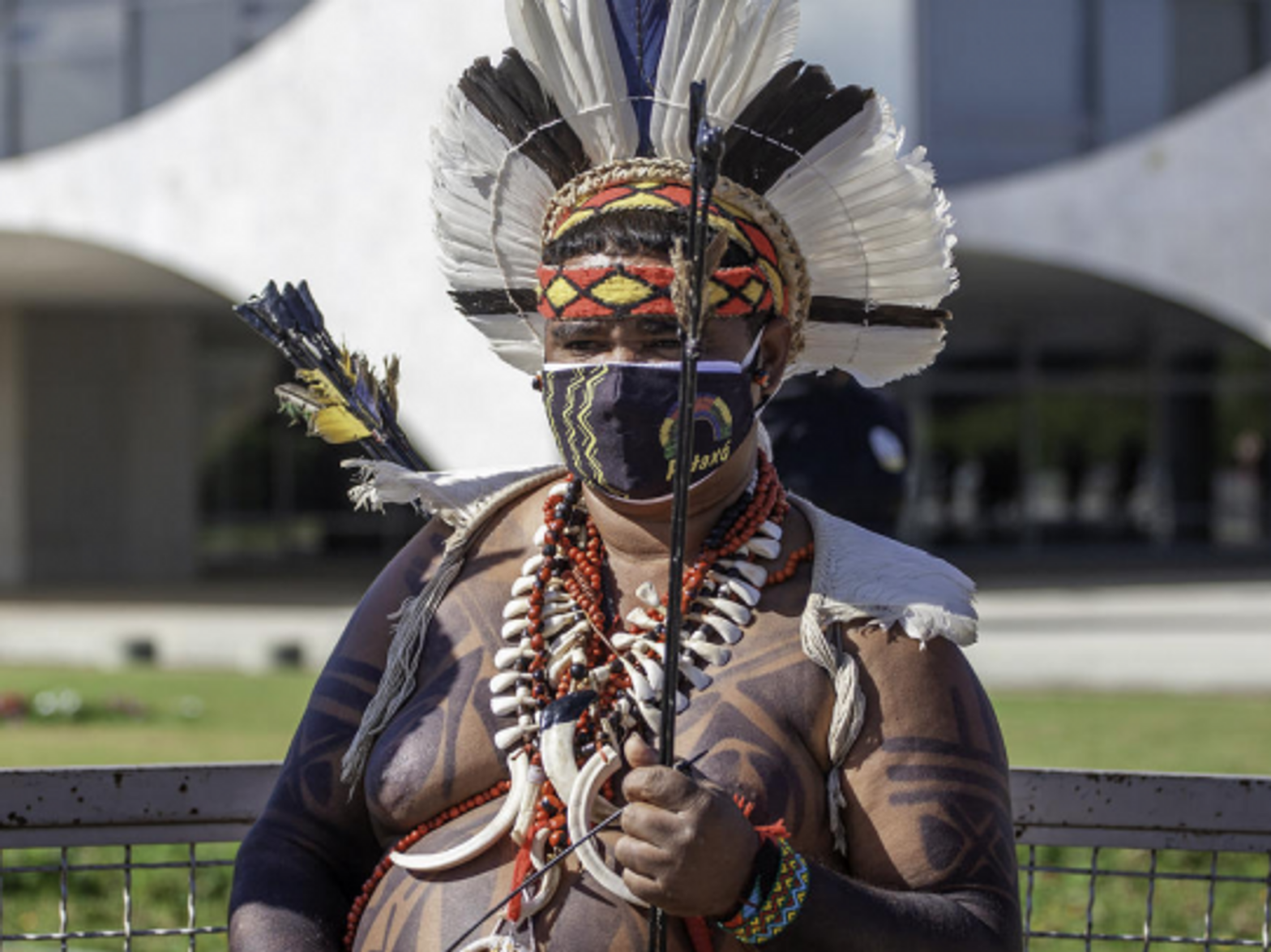 Pataxos Indian protesting a bill by Brazil's government to defend the demarcation of lands.