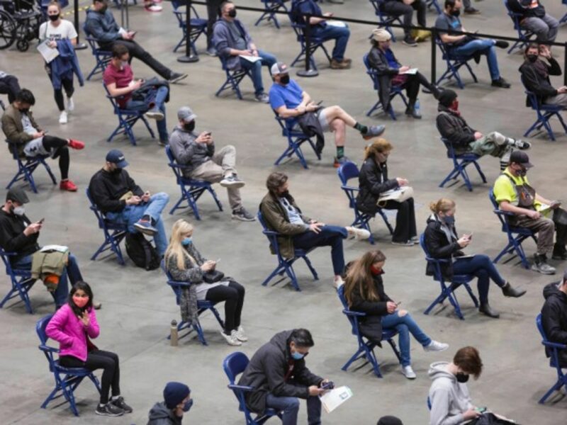 Patients waiting after receiving the first dose of the Pfizer-BioNTech COVID-19 vaccine