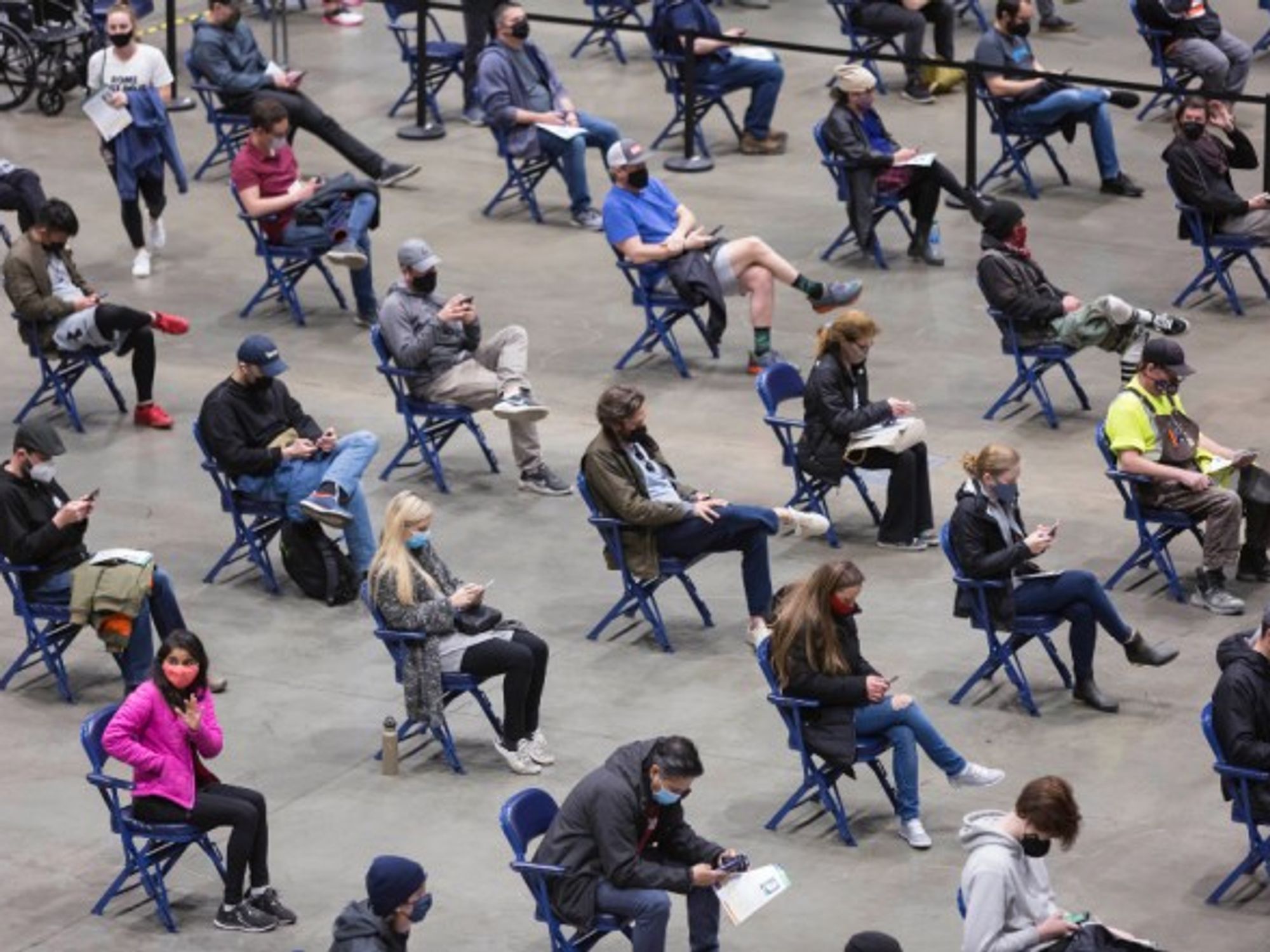 Patients waiting after receiving the first dose of the Pfizer-BioNTech COVID-19 vaccine