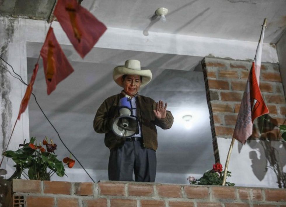 Pedro Castillo talking to his supporters after election results in June