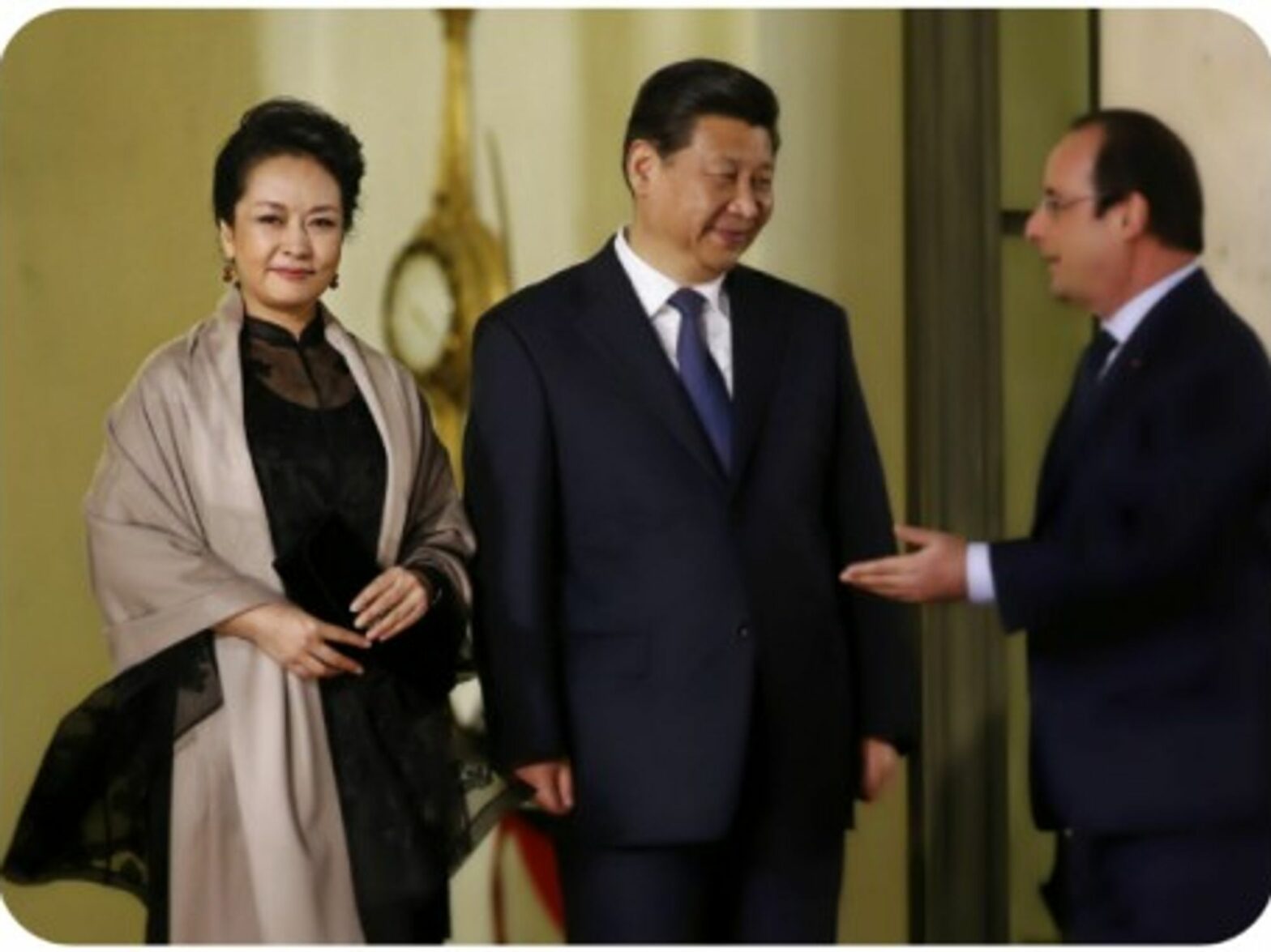 Peng Liyuan and her husband Chinese President Xi Jinping, with French President Francois Hollande