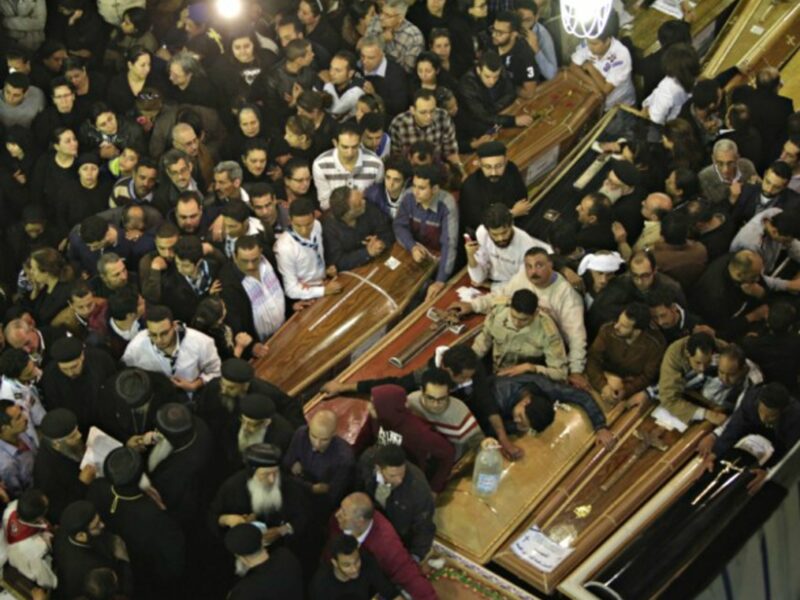 People attend the funeral of victims of the blast in Alexandria, Egypt on Sunday.