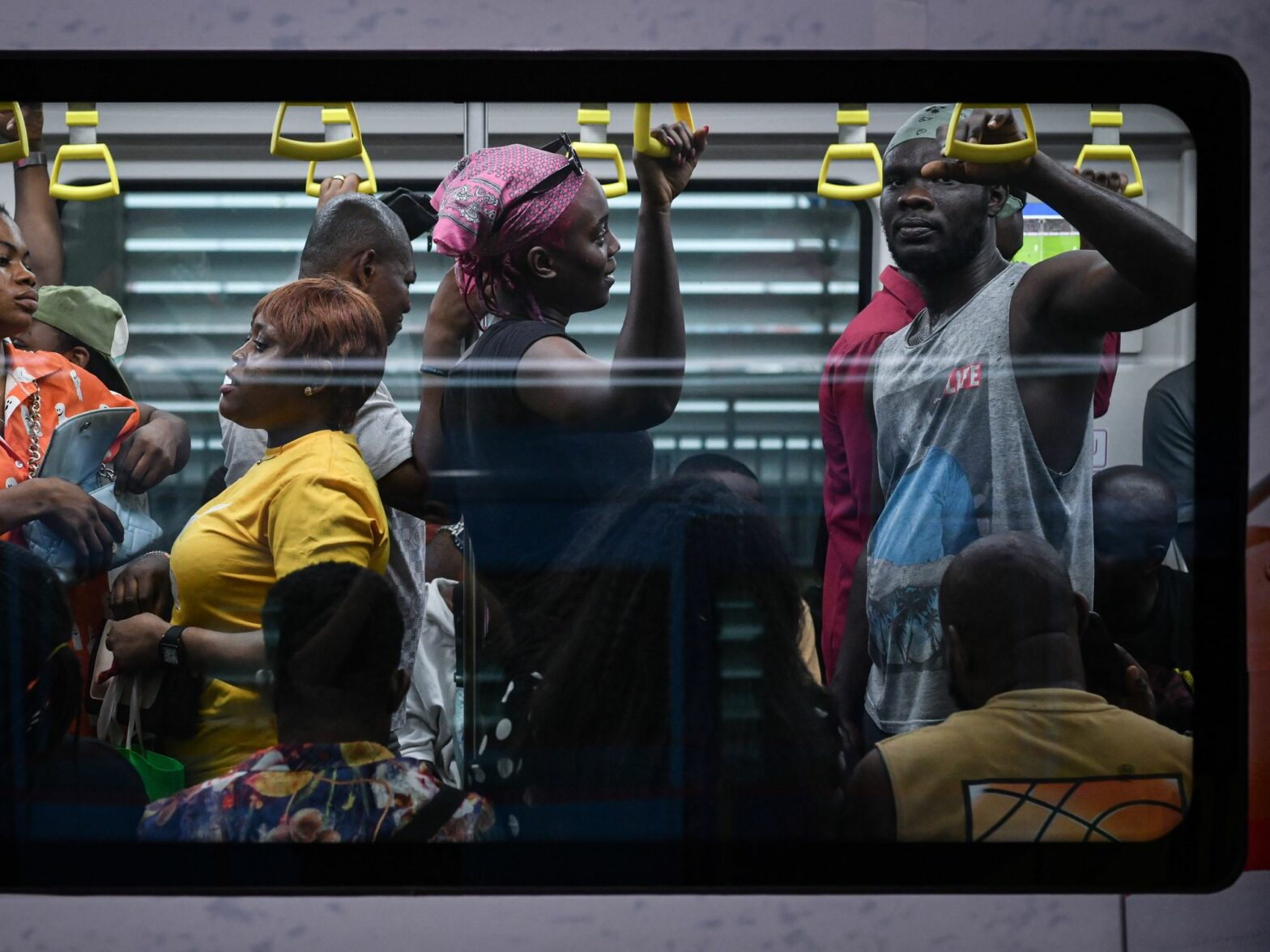 People communting on a the blue line in Lagos, Nigeria