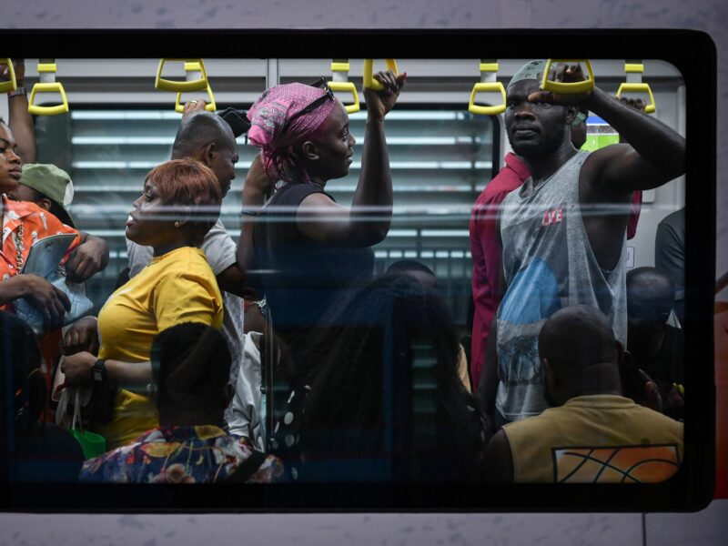 People communting on a the blue line in Lagos, Nigeria