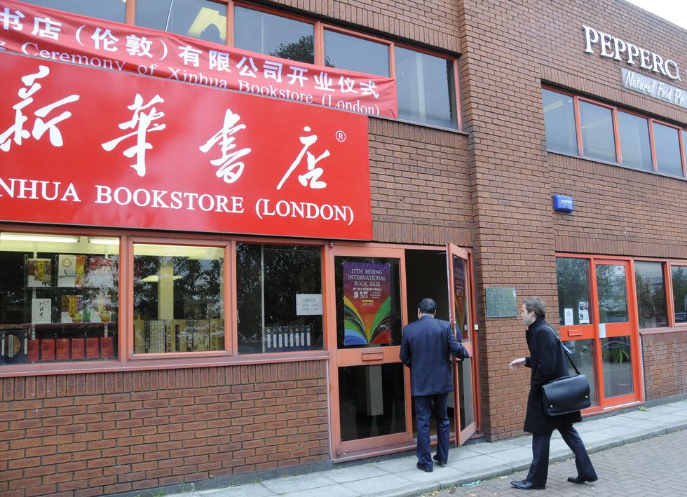 People enter the Xinhua Bookstore in London