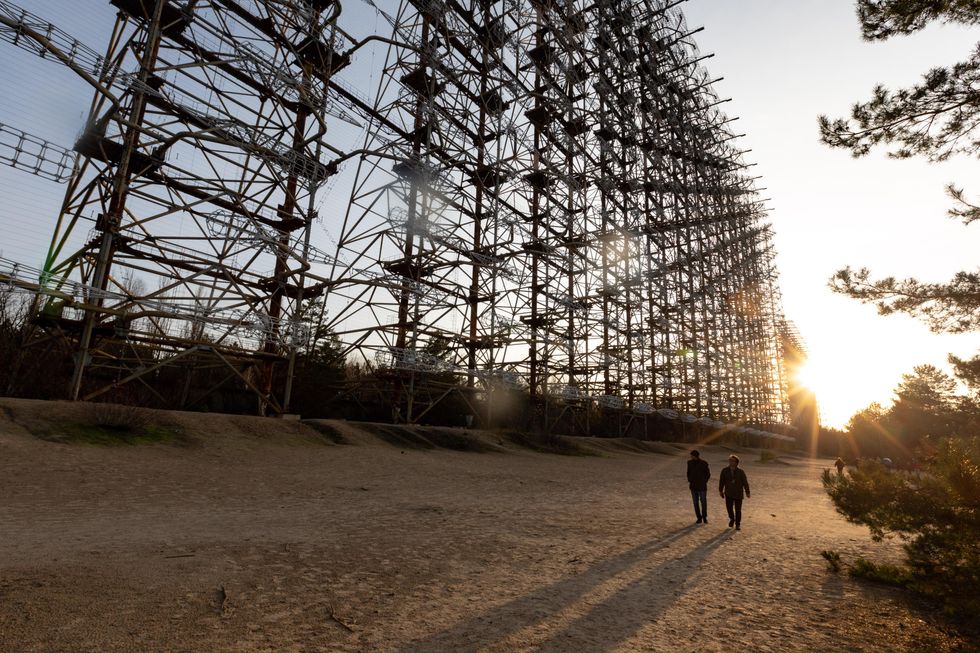 People visit a deserted radar station near the Chernobyl nuclear power plant in Ukraine