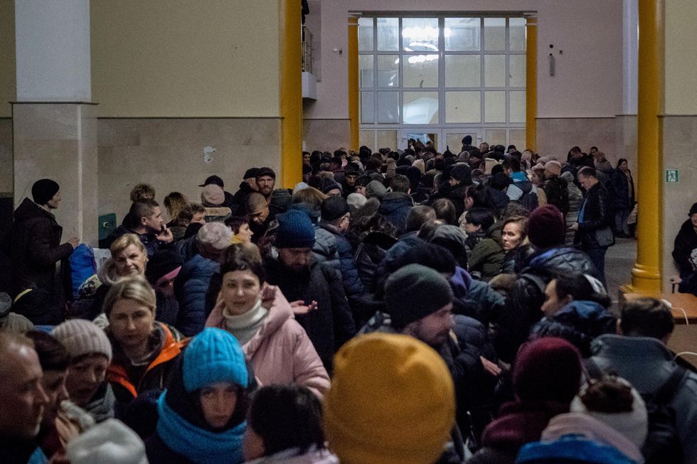 People waiting to board the evacuation train in Kherson amid increased Russian shelling