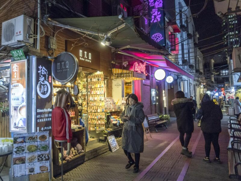 People walk in a Shanghai district