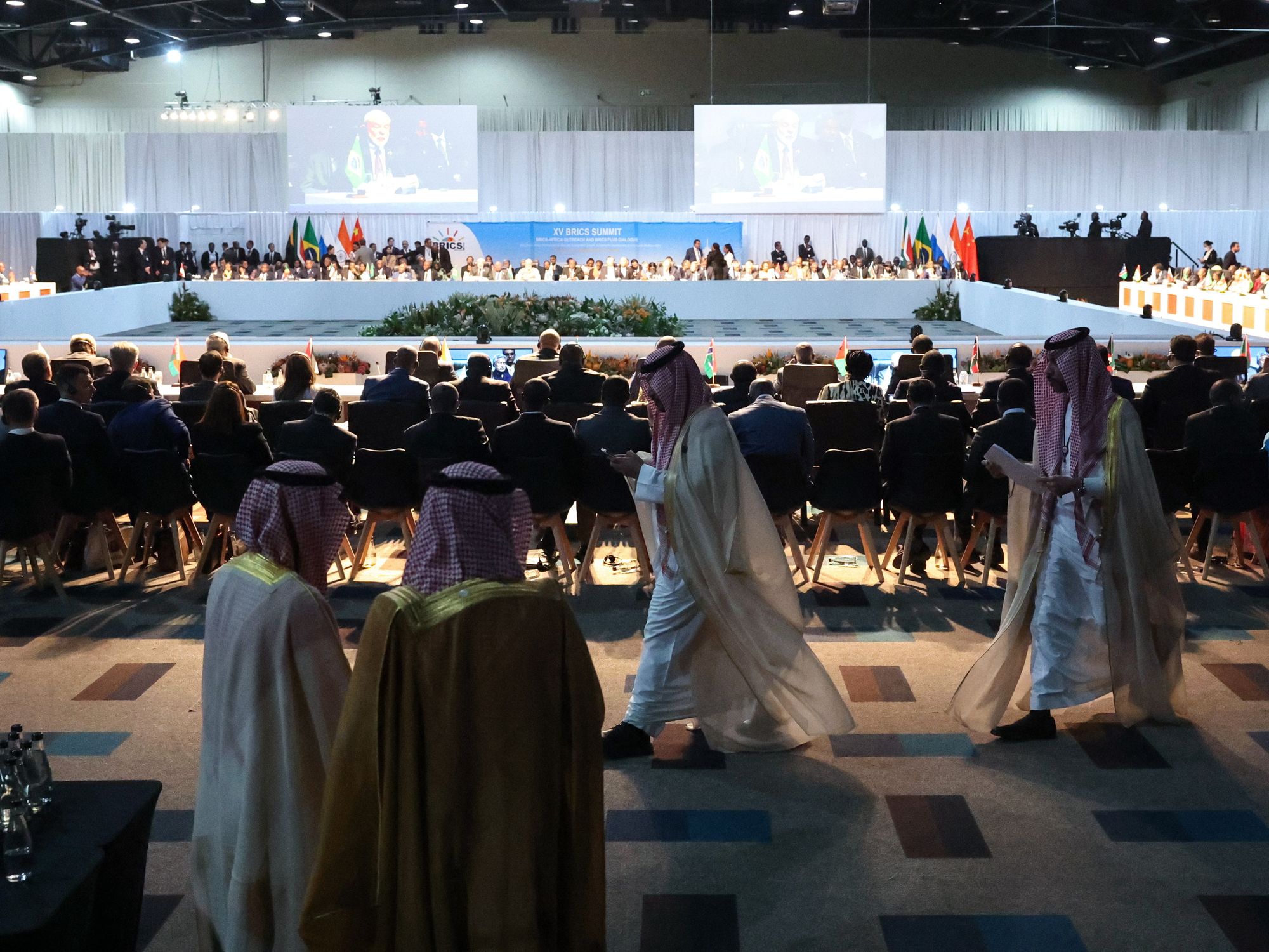 People walking by a conference room at the ​BRICS Summit in Sandton, South Africa on Aug. 24