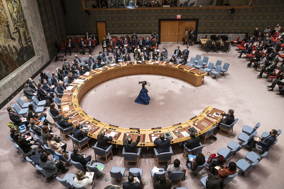 photo from above of UN security council in a semi circle