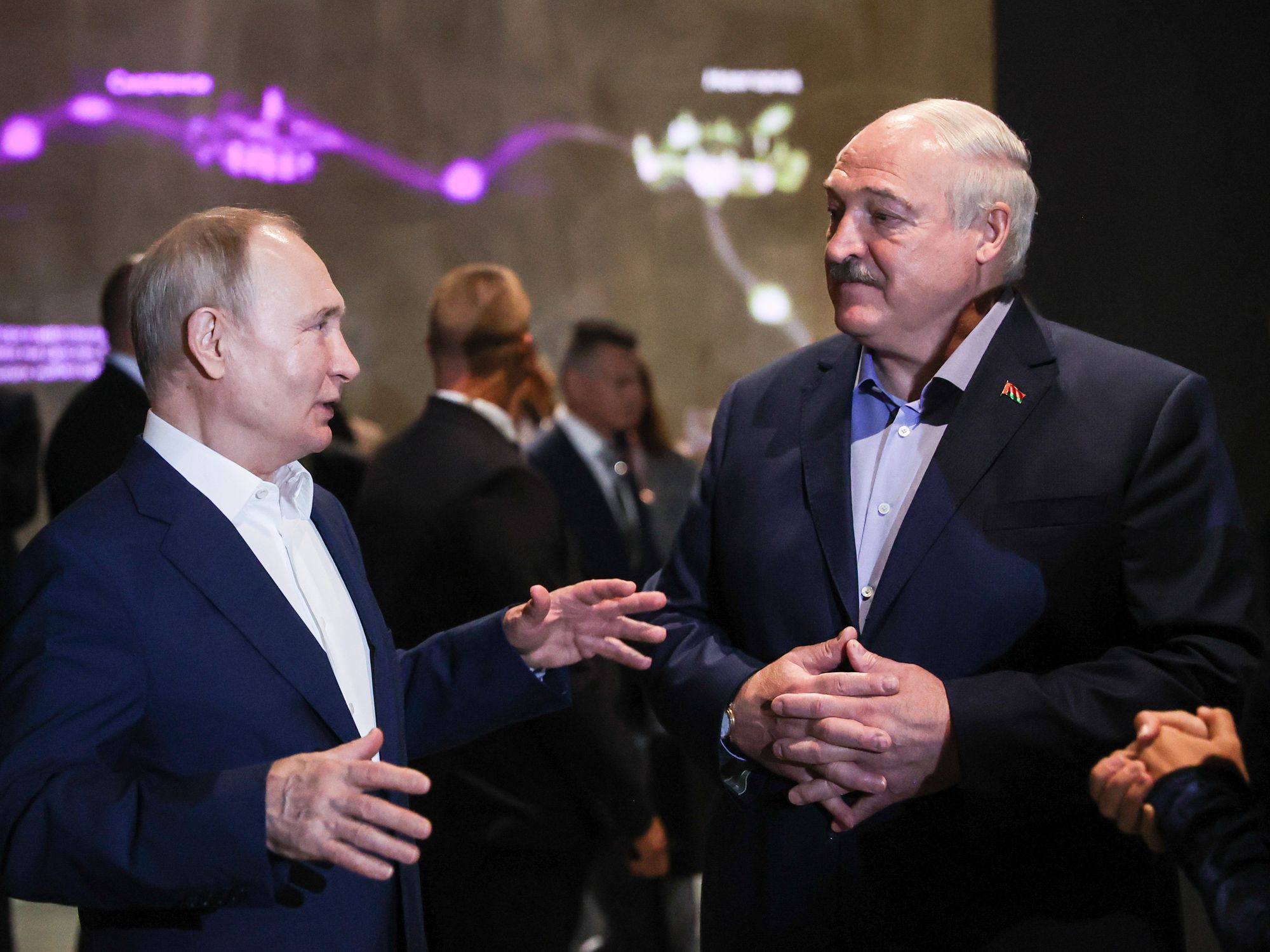 Photo od ​Russian President Vladimir Putin and Belarusian President Alexander Lukashenko talking at an event in St Petersburg, Russia, on July 23