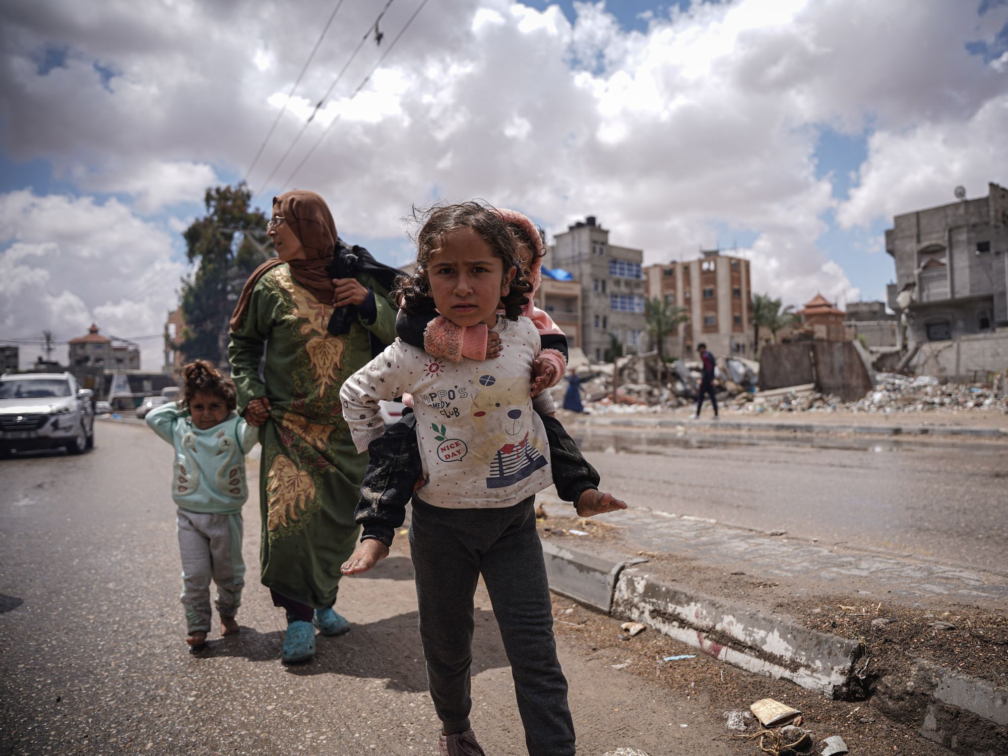 Photo of a a family fleeing Rafah, Gaza, after Israeli Defense Forces ordered the evacuation of parts of the city.