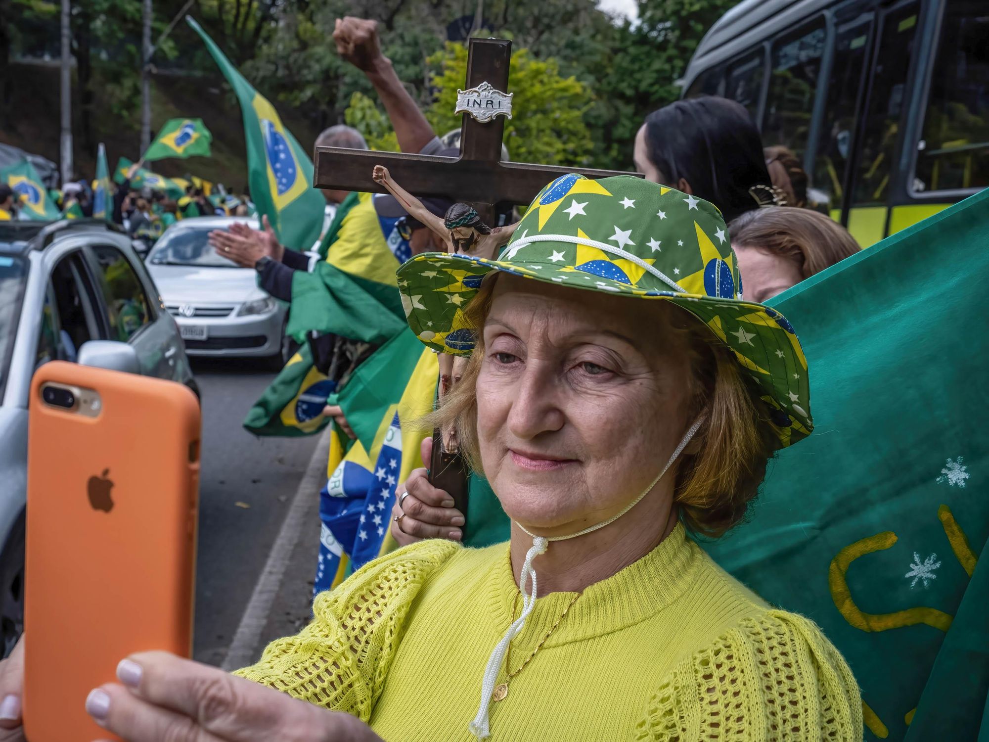 Photo of a Bolsonaro supporter holding a phone