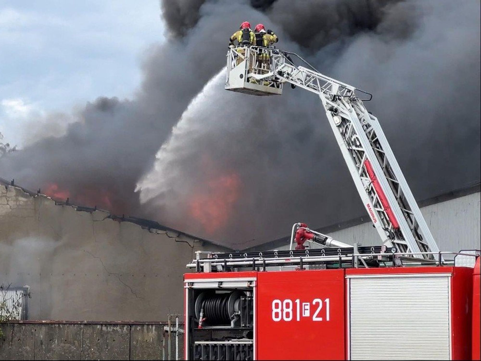 Photo of a burning building.