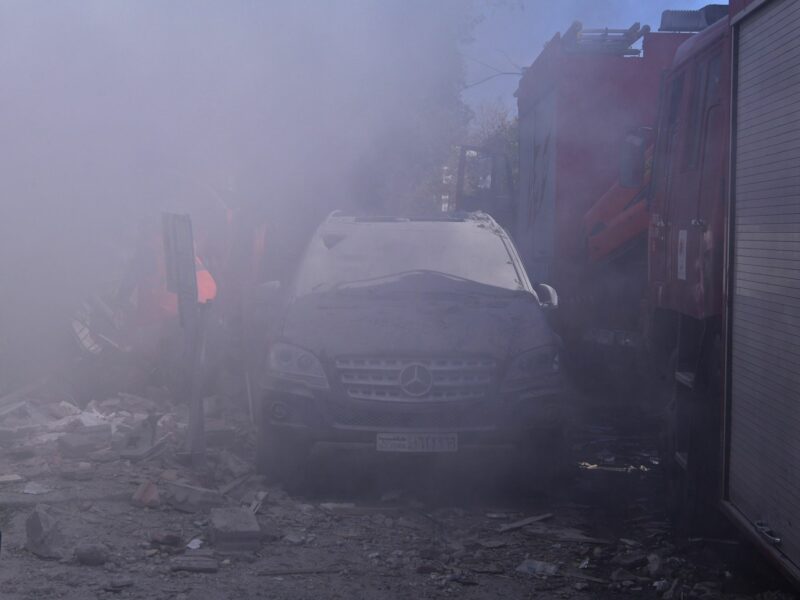 photo of a car in smoke after an explosion