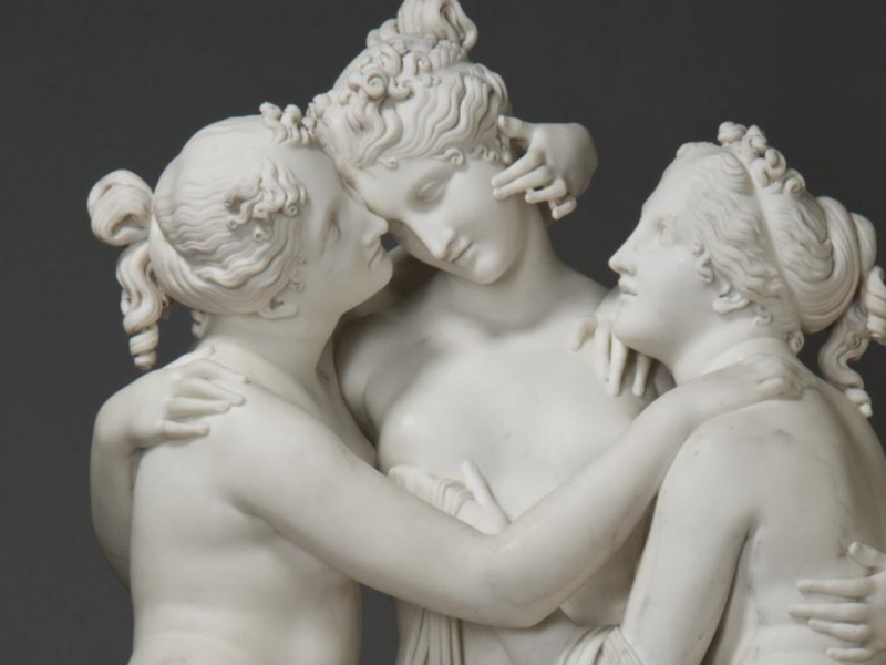 Photo of a classic marble statue representing three women hugging, part of Russia’s short-lived Queer Museum