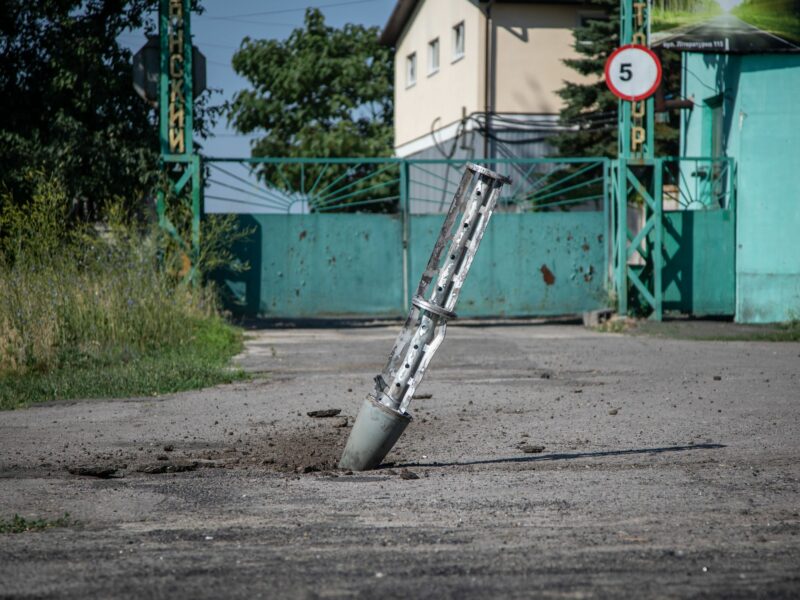 photo of a cluster bomb in the earth