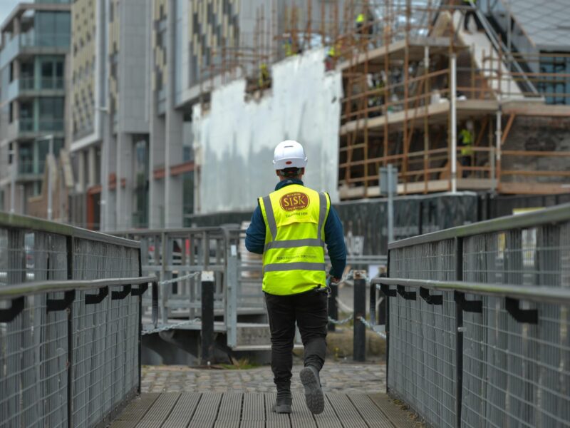 photo of a construction worker in Dublin walking away