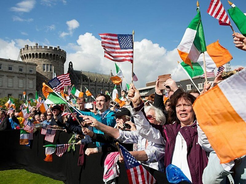 Photo of a ​crowd flying U.S. and Irish flags as they greet then Vice President Joe Biden during a state visit to Dublin in June 2016