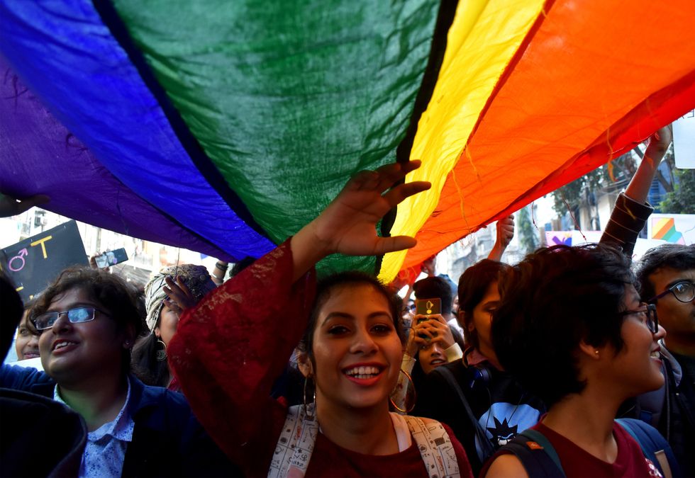 Photo of a ​Pride parade in Kolkata, India.