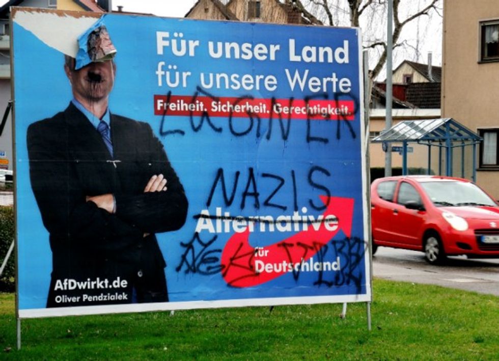 Photo of a graffitied AfD poster