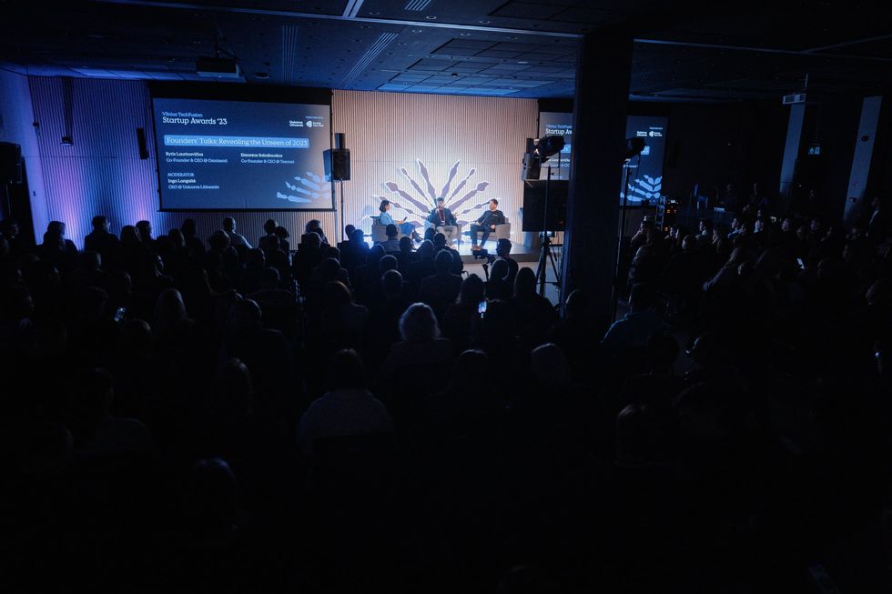Photo of a group of people gathered at ​a startup conference in Vilnius, Lithuania