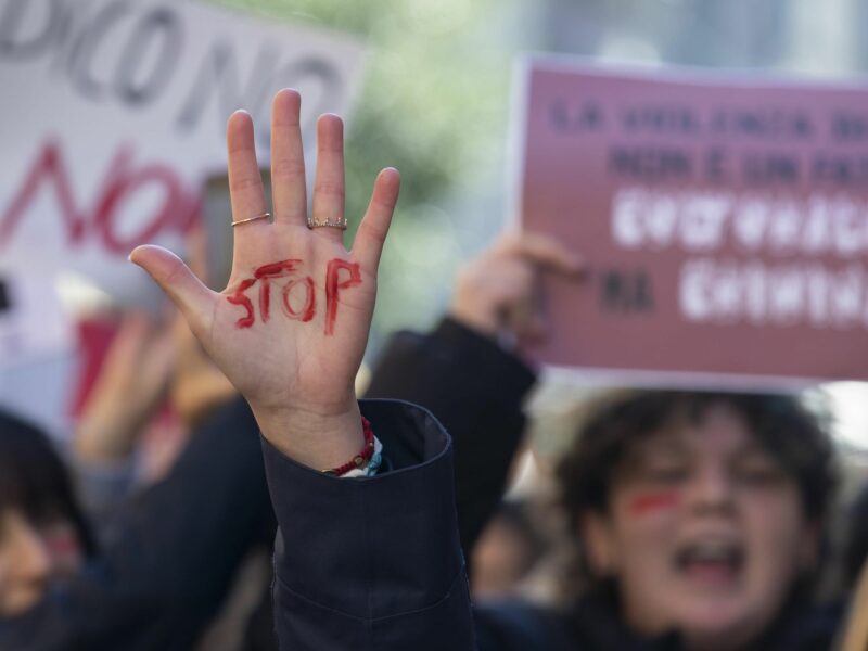 photo of a hand with the word "stop"