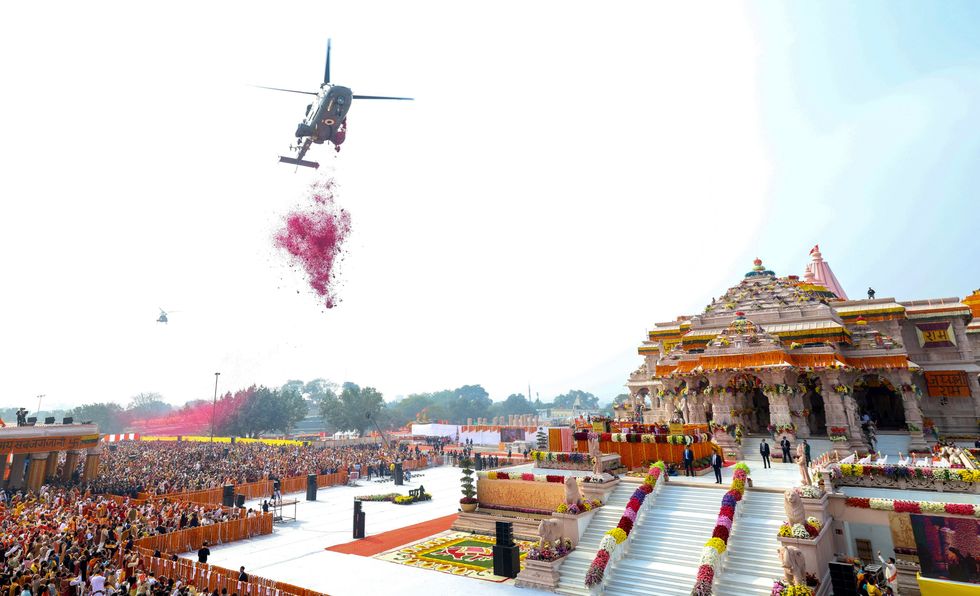photo of a hellicopter dropping flower pedals