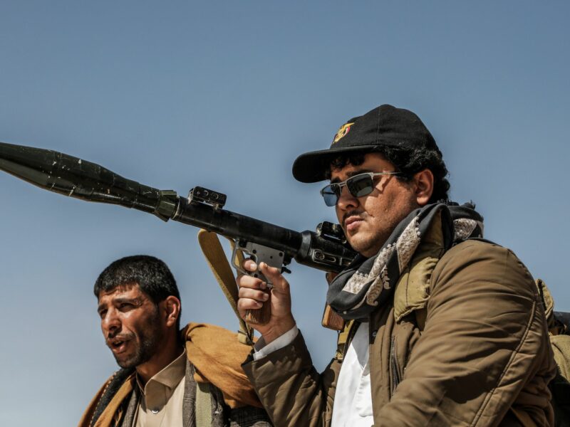 Photo of a Houthi rebel carrying a rocket launcher in Sanaa, Yemen