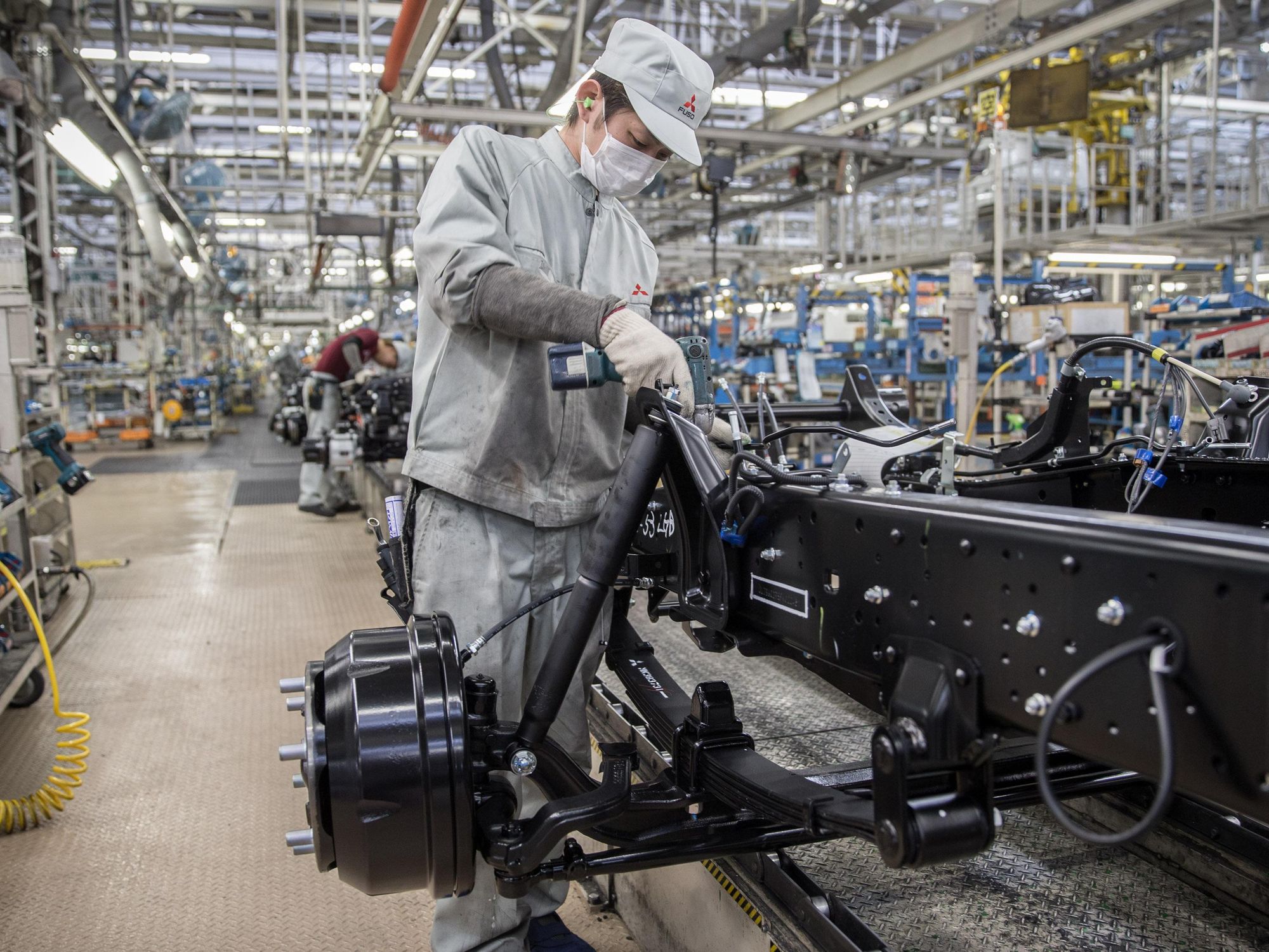 Photo of a Japanese car manufacturer in Japan assembling parts