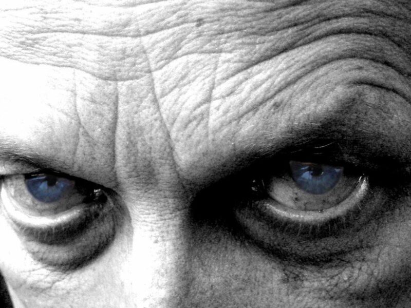 photo of a man closeup with blue eyes