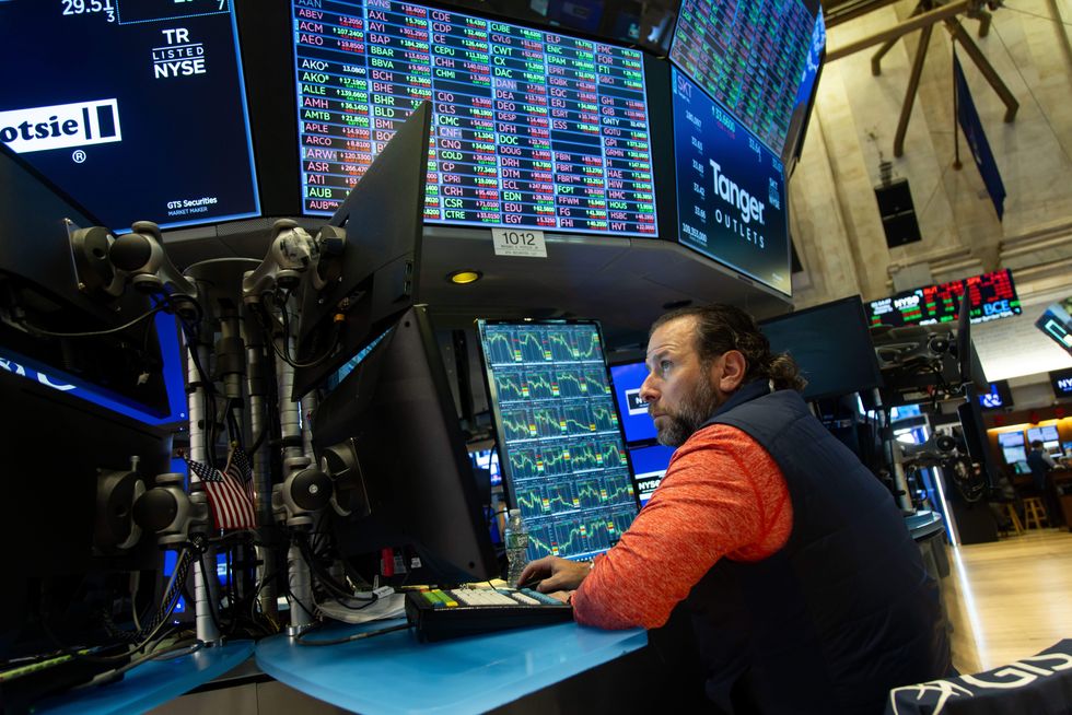 photo of a man on the floor of the New York Stock Exchange