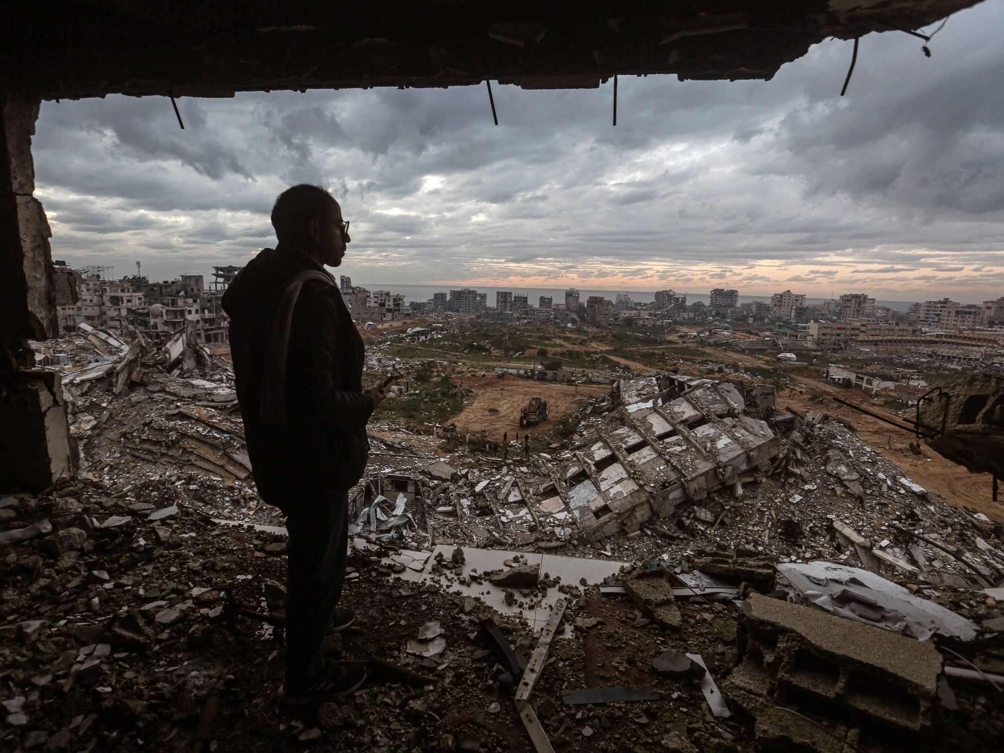 Photo of a man overlooking Gaza