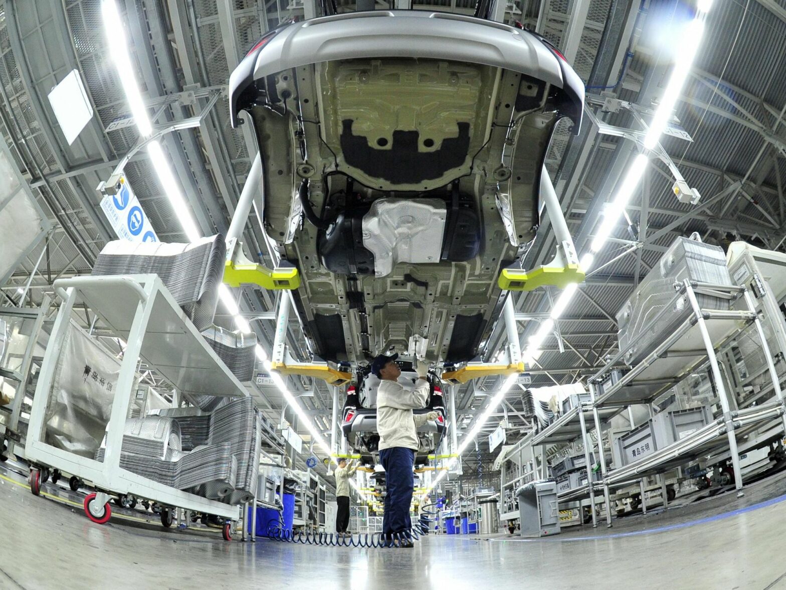 Photo of a man working at the Hyundai car plant in Cangzhou City.