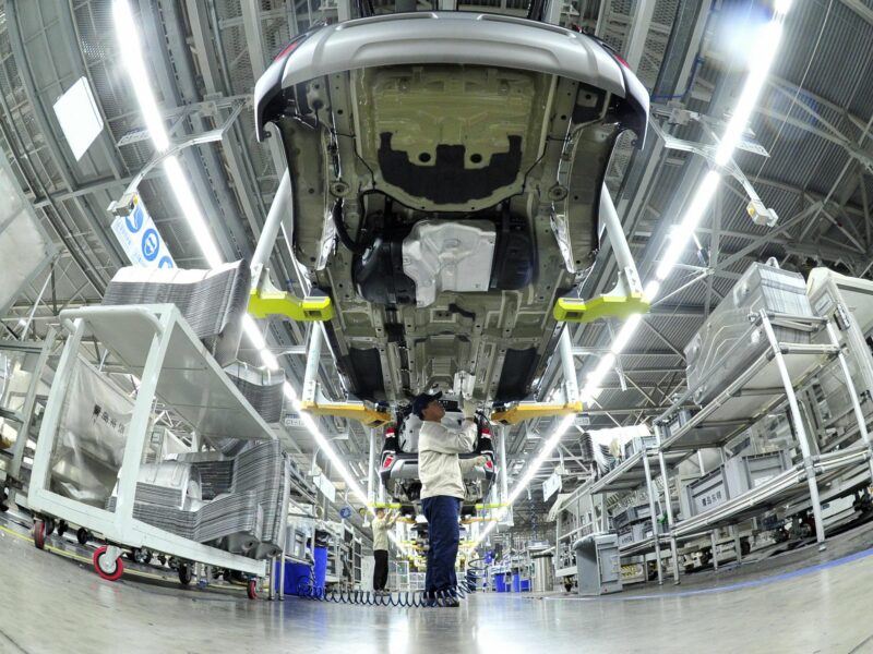 Photo of a man working at the Hyundai car plant in Cangzhou City.