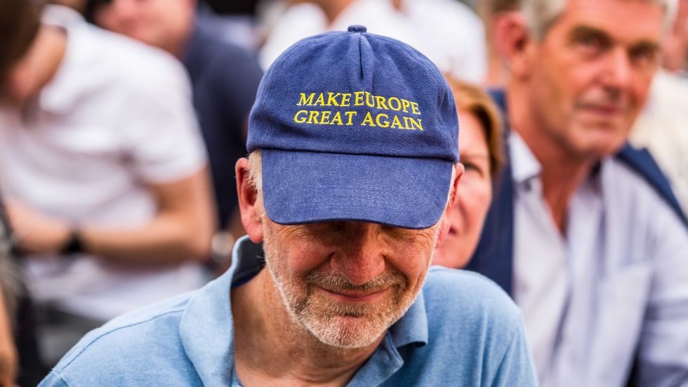 Photo of a member of Germany's liberal party FDP wears a ''MAKE EUROPE GREAT AGAIN'' hat