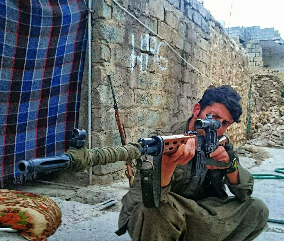 Photo of a member of the Kurdish PKK Guerilla