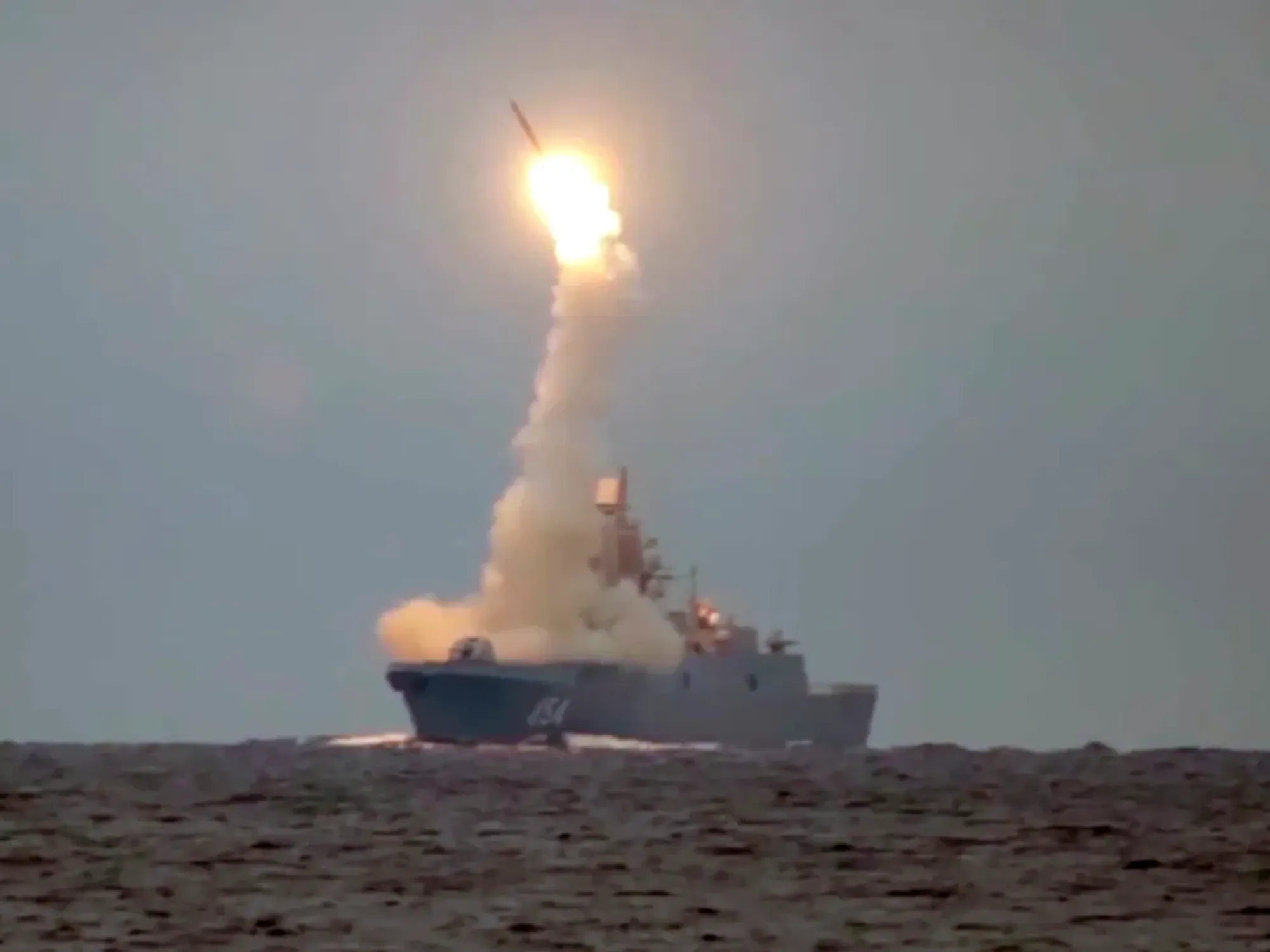 photo of a missile being fired from a ship