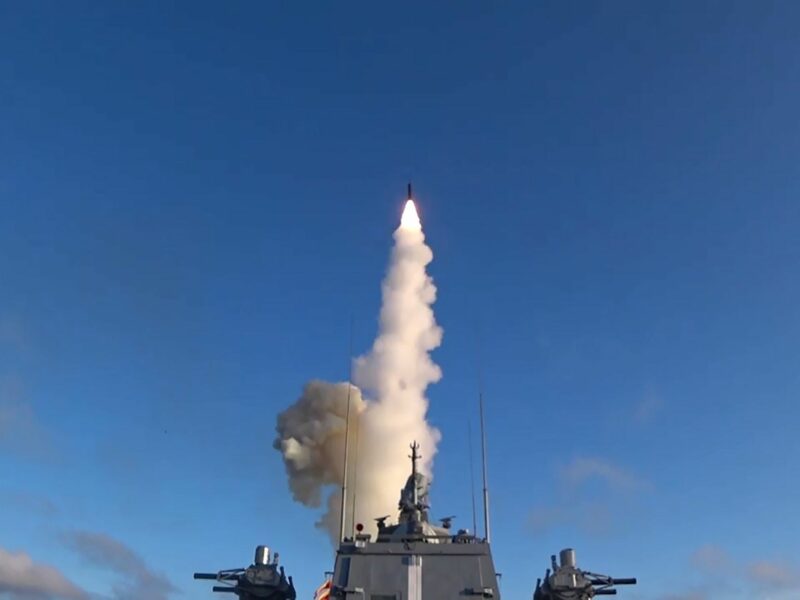 photo of a missile going up with smoke