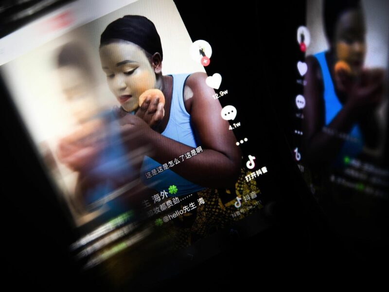 Photo of a mobile phone displaying an "African makeup" tutorial on Douyin, TikTok's version of its platform designed for the Chinese market