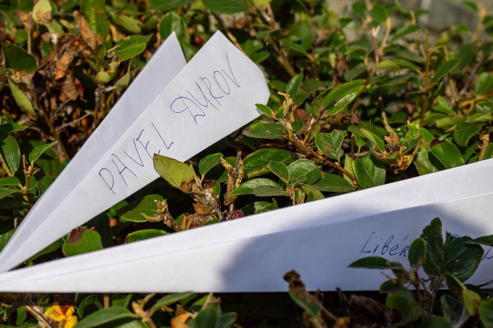Photo of a paper plane, symbolizing the Telegram app, is placed in front of the French embassy in Moscow, Russia.