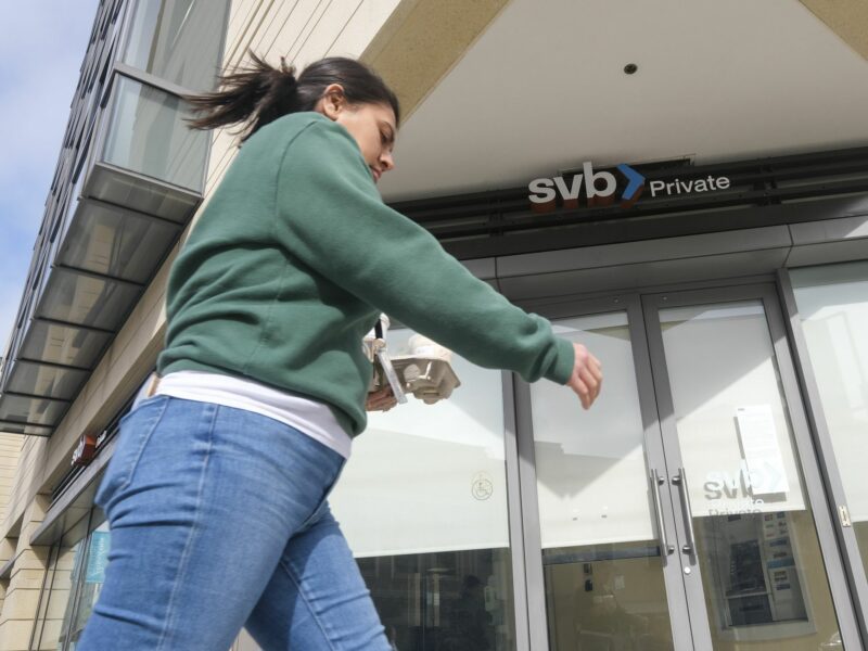 Photo of a person in front of a Silicon Valley Bank