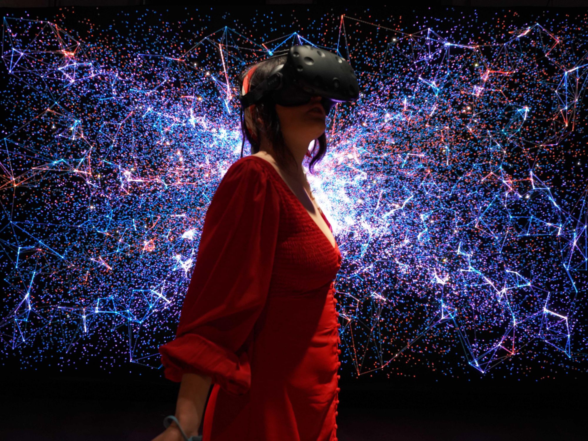 Photo of a person testing out a virtual reality experience