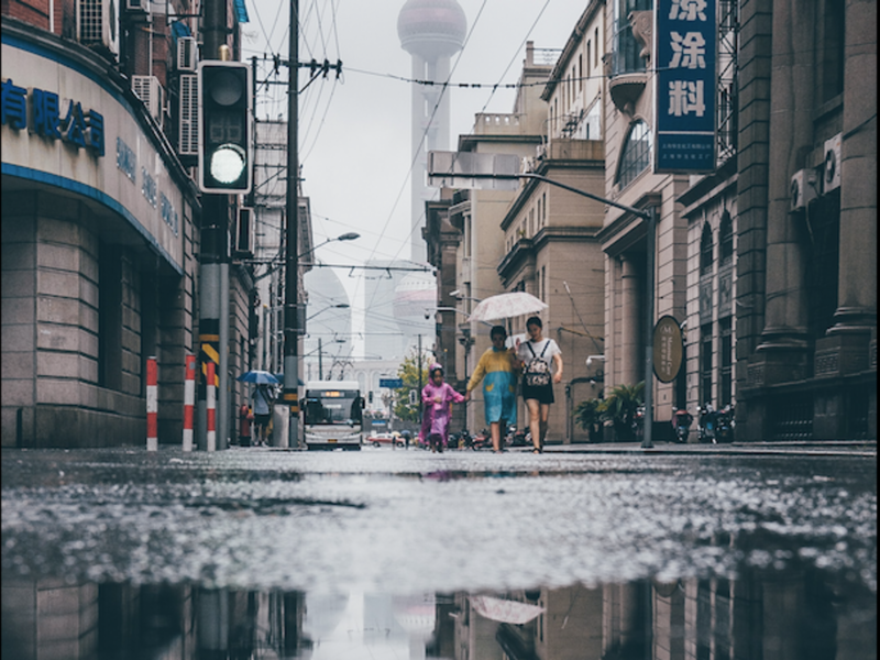 photo of a puddle in a street in Shanghai