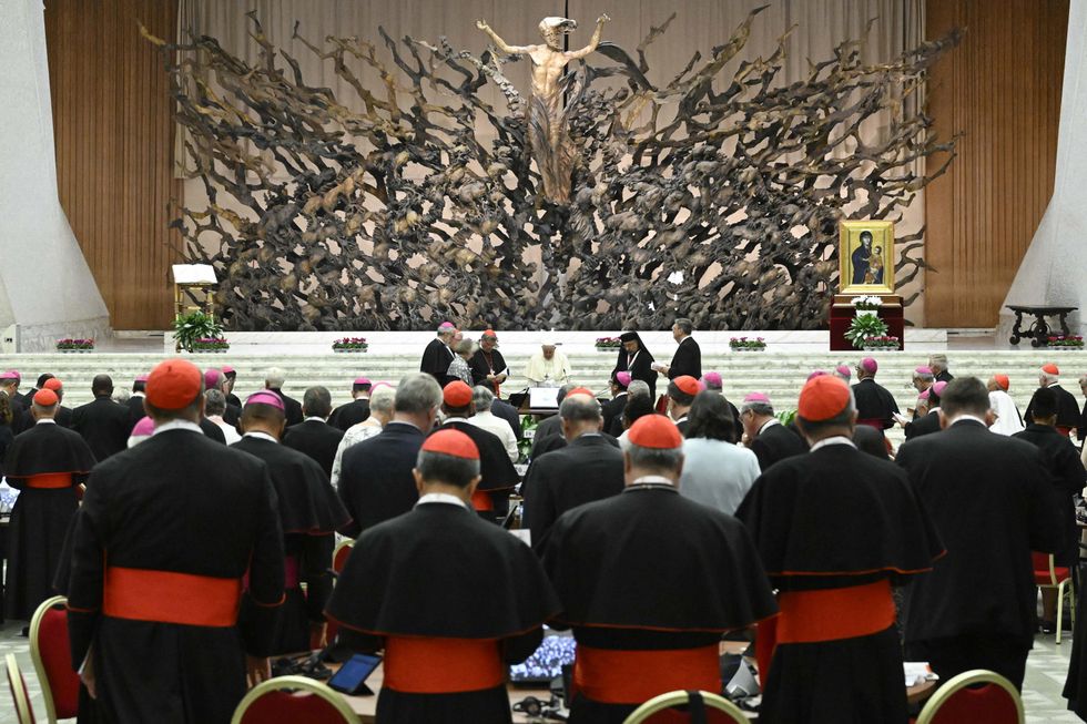 photo of a room filled with cardinals and bishops