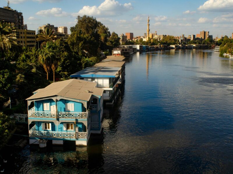 Photo of a row of houseboats floating on the Nile in Cairo, Egypt