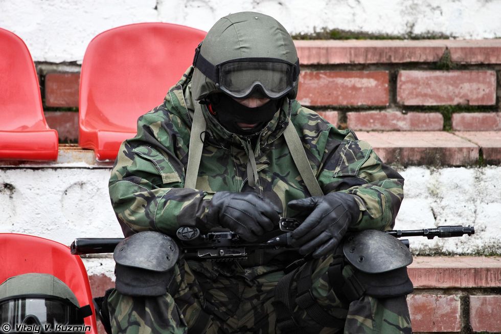 Photo of a Russian soldier looking down