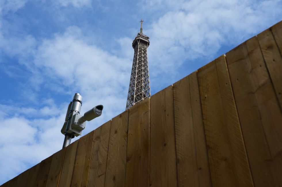 photo of a security video camera near eiffel tower